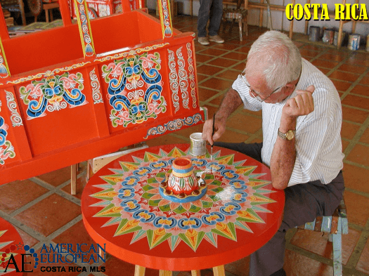 Sarchi artisans working on the famous Oxcart wheel